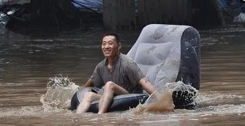 梦境解析，梦见下大雨涨大水，亲人们齐力助我洗衣的深层含义